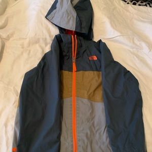 Size 10-12 boys North Face rain jacket.